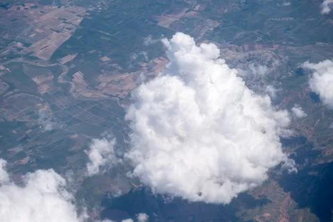 Big white clouds in a blue sky close-up. There is a place for the text Stock Photos