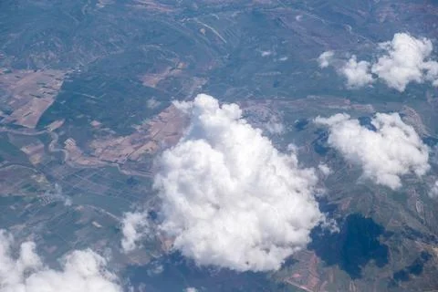 Big white clouds in a blue sky close-up. There is a place for the text Stock Photos