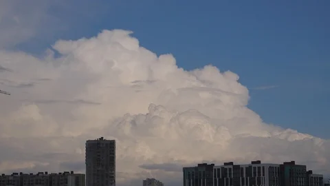 Big white clouds over the city Stock Footage 108395341