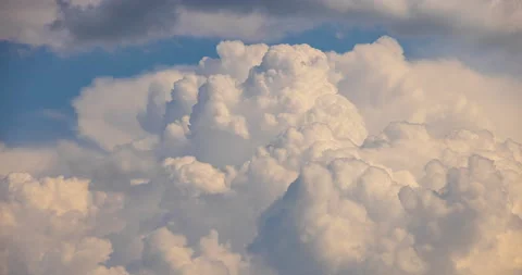 Big white cumulus cloud, fast forming cloudscape 8K, blue sky speed up timelapse Stock Footage 155511172