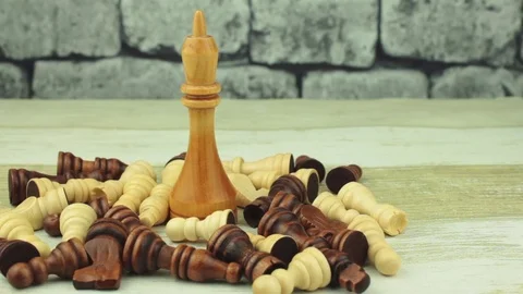 The big white king among small chess Stock Footage 78555963