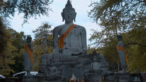 Big white painted stone statue of The Buddha in Wat Worachettharam temple Video stock 308891506