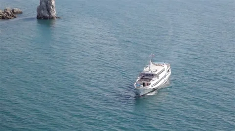 Big white ship sails into the bay Stock Footage 45193393