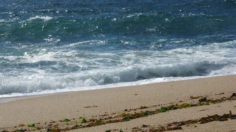Big white waves crashing on the sandy beach Stock Footage 109252653