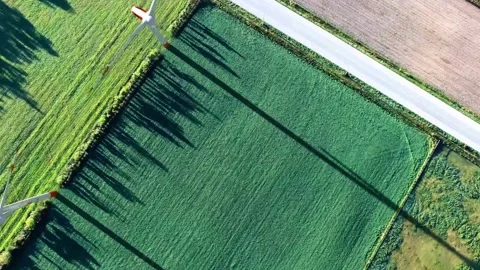 Big wind vane in the rice fields 스톡 동영상 221390446