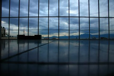 Big window with cloudy sky Stock Photos