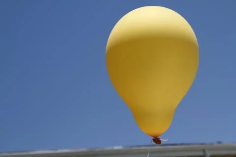 Big yellow balloon Stock Photos