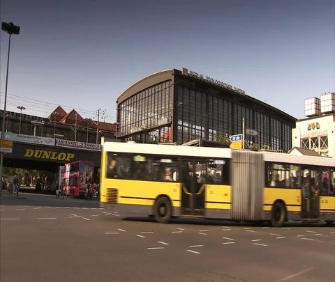 Big yellow bus pulls out in front of Zoo Railway Station Stock Footage 86742931
