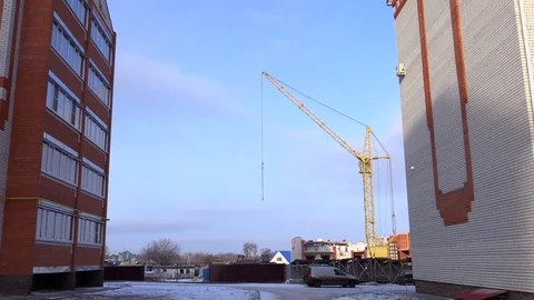 Big yellow construction crane in winter Stock Footage 85794411