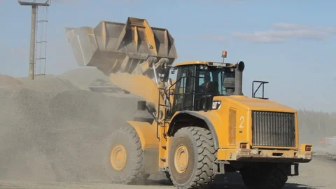 Big yellow excavator in the work Stock Footage 129618402