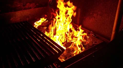 Big yellow flame, at a barbeque, in a restaurant Stock Footage 55878229