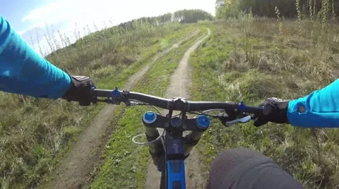 On the bike on the field Stock Footage 62910083