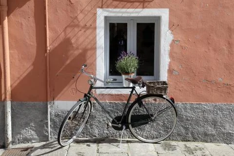 The bike in front of the window Stock Photos