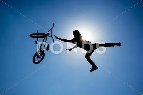 Bike jump silhouette Stock Photos