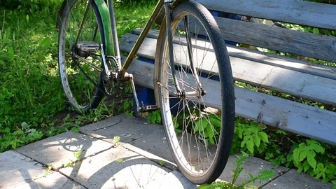 Bike parked at the bench Stock Footage 110837521