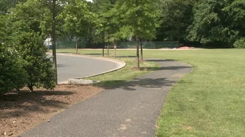 Bike path along side road Video stock 8981316