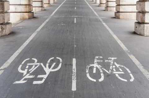 Bike path under Bercy bridge in Paris Stock Photos
