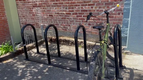 Bike rack outside of a store Stock Footage 245325737