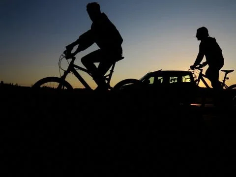 Bike sunset silhouette Stock Photos