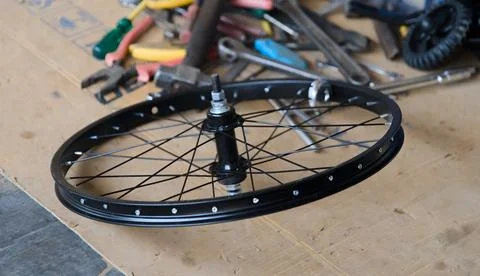 Bike Wheel and Tools Workshop Stock Photos