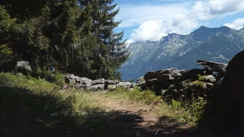 Biker on alpine path and panorama Stock-Footage 114175856