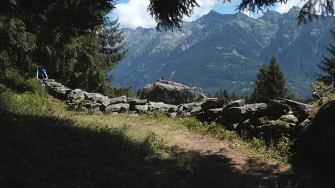Biker on alpine trail with rocks Stock-Footage 114175590