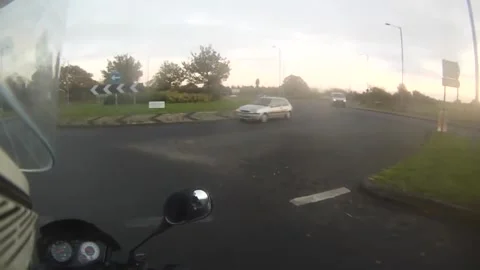 Biker Crashes On Roundabout Stock Footage 272910174