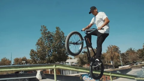 BIKER DOING TRICK IN A SKATE PARK SLOW MOTION Stock Footage 102401563