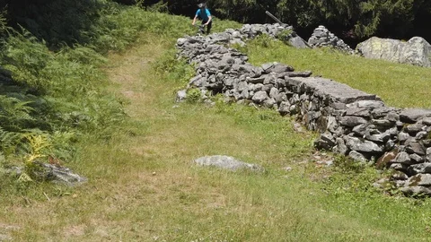 Biker during downhill session Stock-Footage 114176405