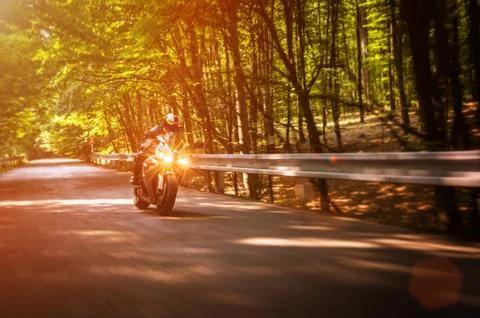 Biker at dusk Stock Photos