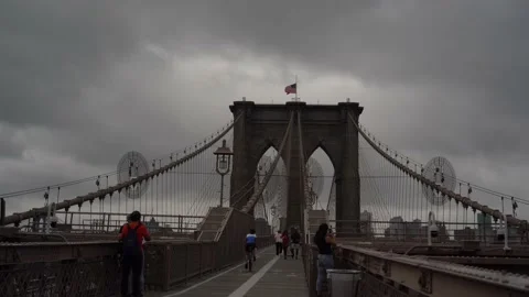 Biker Going Across Brooklyn Bridge - Brooklyn, New York Stock Footage 138905129