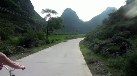 A biker in a landscape Stock Footage 11505129