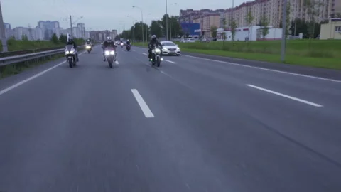 Biker on a motorcycle performs a dance move Stock-Footage 102362306