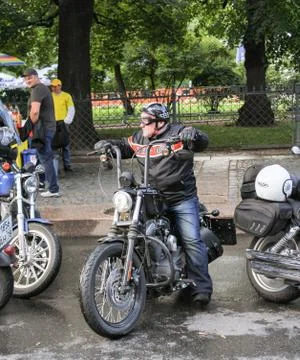 A biker on a motorcycle. Stock Photos