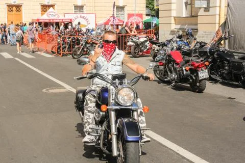 A biker on a motorcycle. Stock Photos