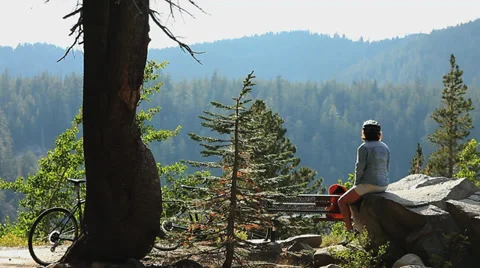 BIKER IN MOUNTAINS Stock Footage 28837054