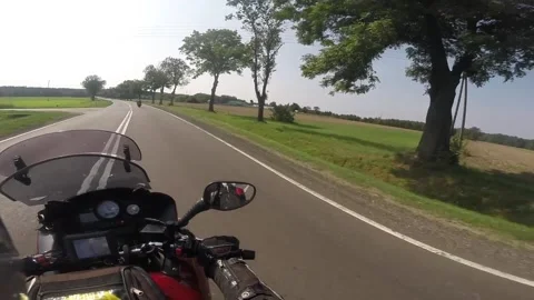 Biker moves on highway Video stock 133834766