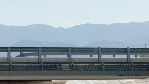 Biker riding over a bridge 1 Stock Footage 106466902