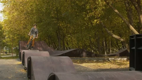 Biker riding on the pump track Stock Footage 143790642