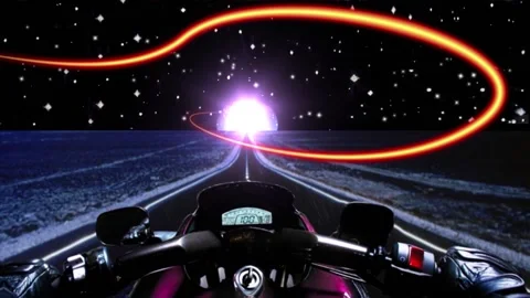 A biker on the road heading towards a light. fantasy theme Stock Footage 220307881