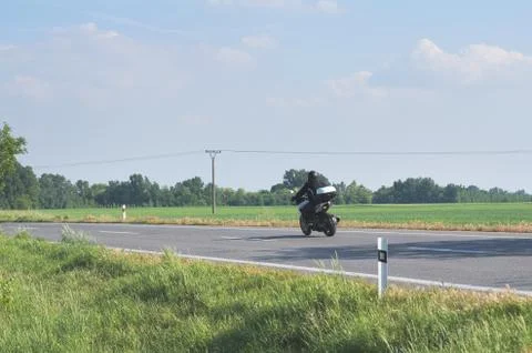 Biker on the Road Stock Photos