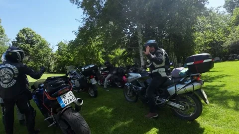 Biker say hello Stock Footage 277225720
