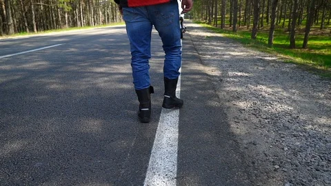The biker sits down on the motorcycle Stock Footage 88499448