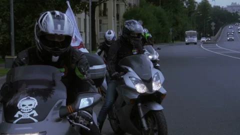 Bikers begin to move slowly Stock-Footage 102360924