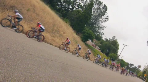 BIKERS RACE UPHILL Stock Footage 5649206
