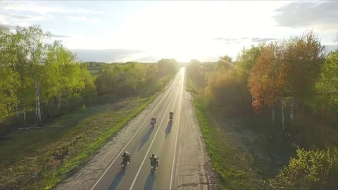 Bikers ride into the sunset Видео 76251435