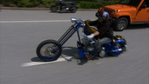 Bikers rides decorated Harley Davidson bike on road during fifth National Rally Stock Footage 88728084