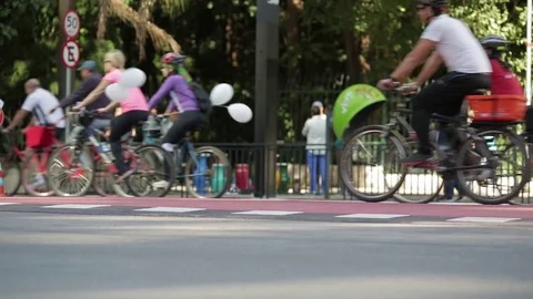 Bikers riding bicycles during regional biking day Stock Footage