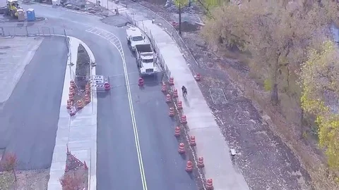 Bikers riding down a trail Stock Footage 69152986