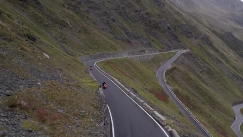 Bikers Riding On An Empty Road Overlooking A Beautiful Scenery With Video stock 252151478